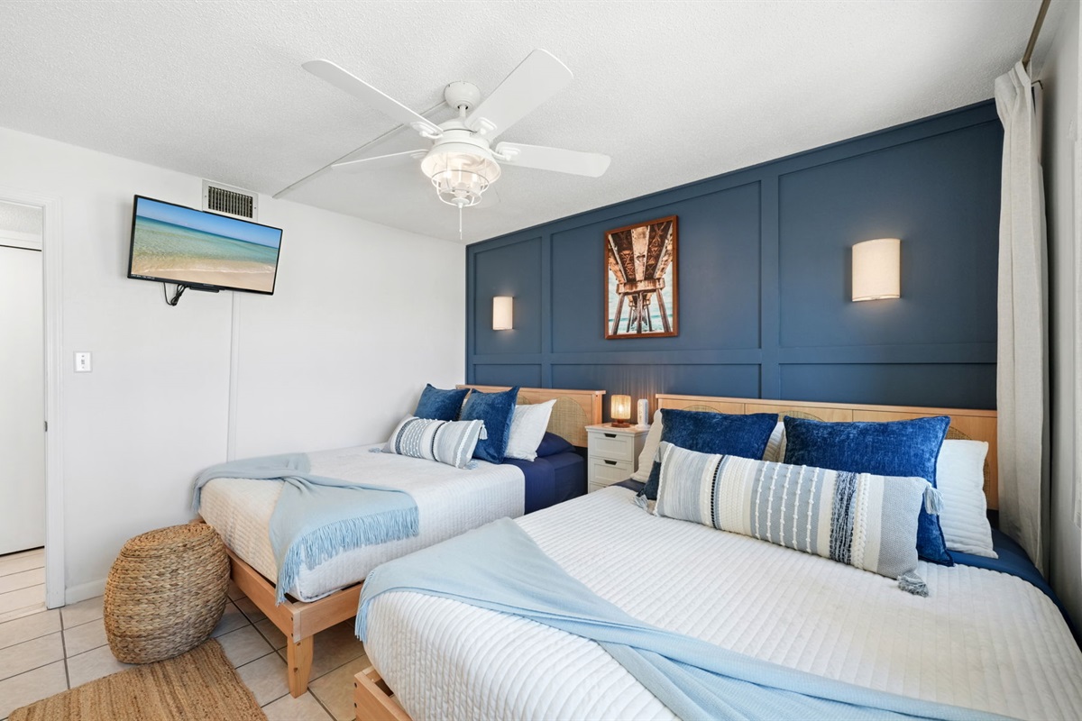 Cozy bedroom with panoramic views of the beach from the window