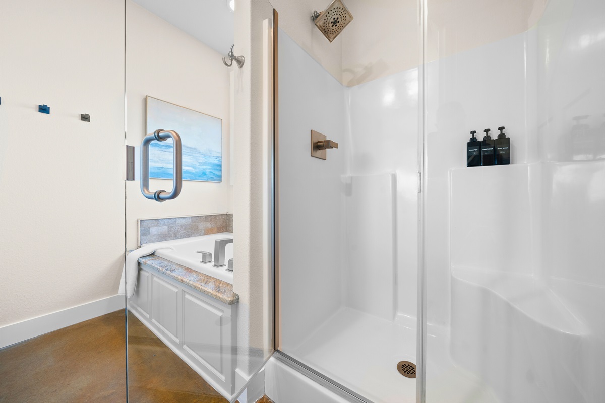 The walk-in shower and separate tub provide a spa-like feel that makes everyday routines feel just a bit more luxurious.