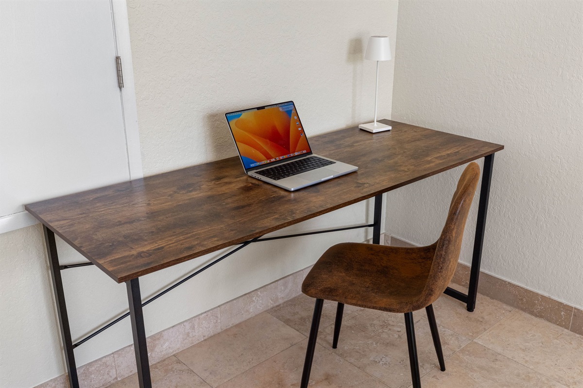 Enjoy the convenience of a combined sleeping and working space, complete with a laptop-ready desk.