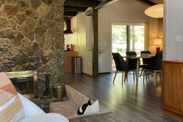 Looking towards the dining room and back door from living room.