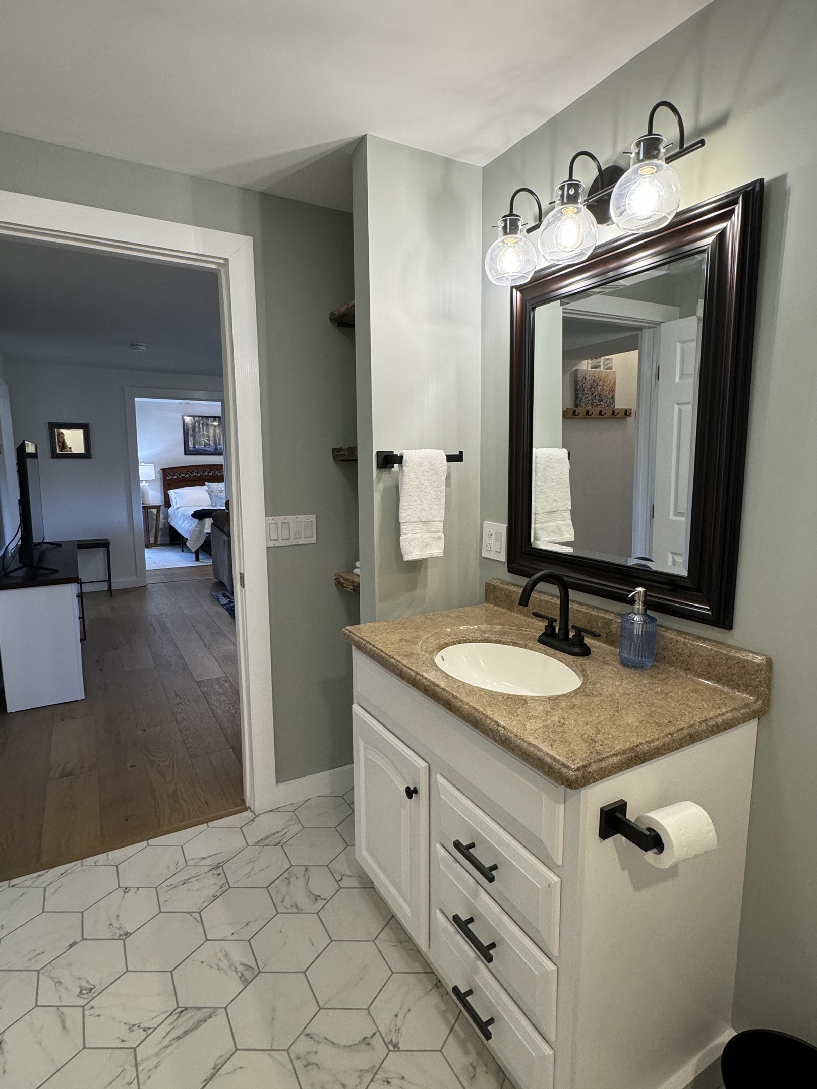 Bathroom with living room and Queen #2 beyond