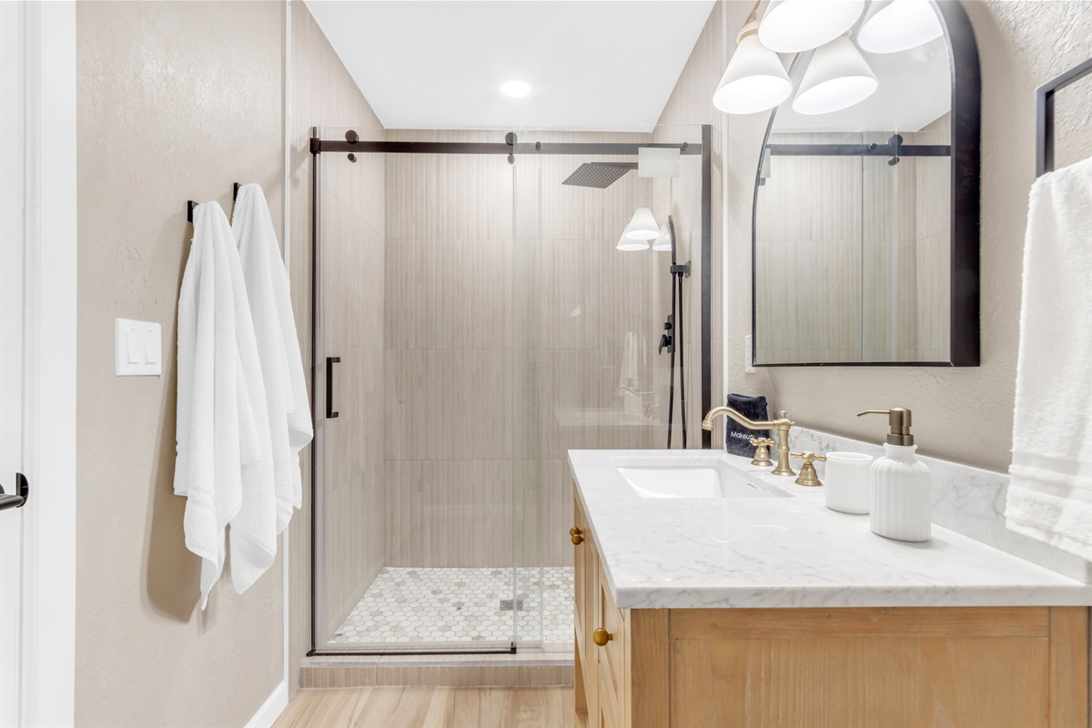 Bathroom #3 is a full bath with modern upgrades