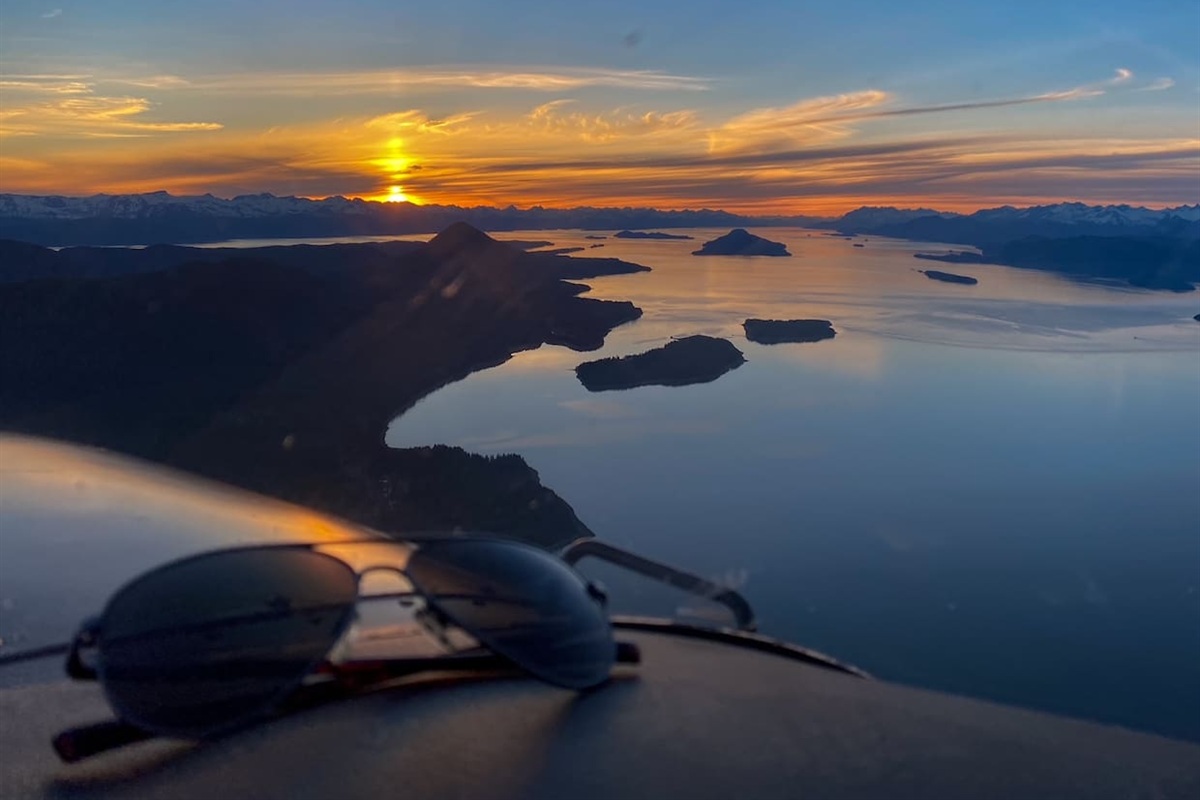 S.E. By sky and water are experiences you will never forget. Sunset over the Chilkat Mountian range just a few miles from the Juneau Airport. 