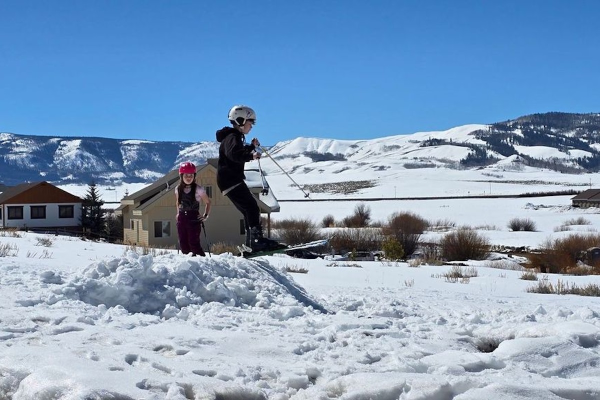 Kids like to ski off the hill to the side of our home