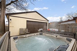 Infused backyard with leisure and flavor through a hot tub