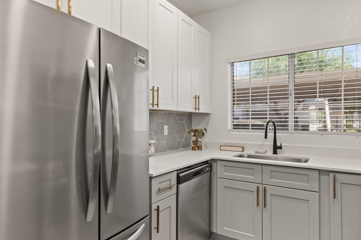 Fully equipped kitchen with modern appliances, ample counter space, and everything you need to prepare meals during your stay.