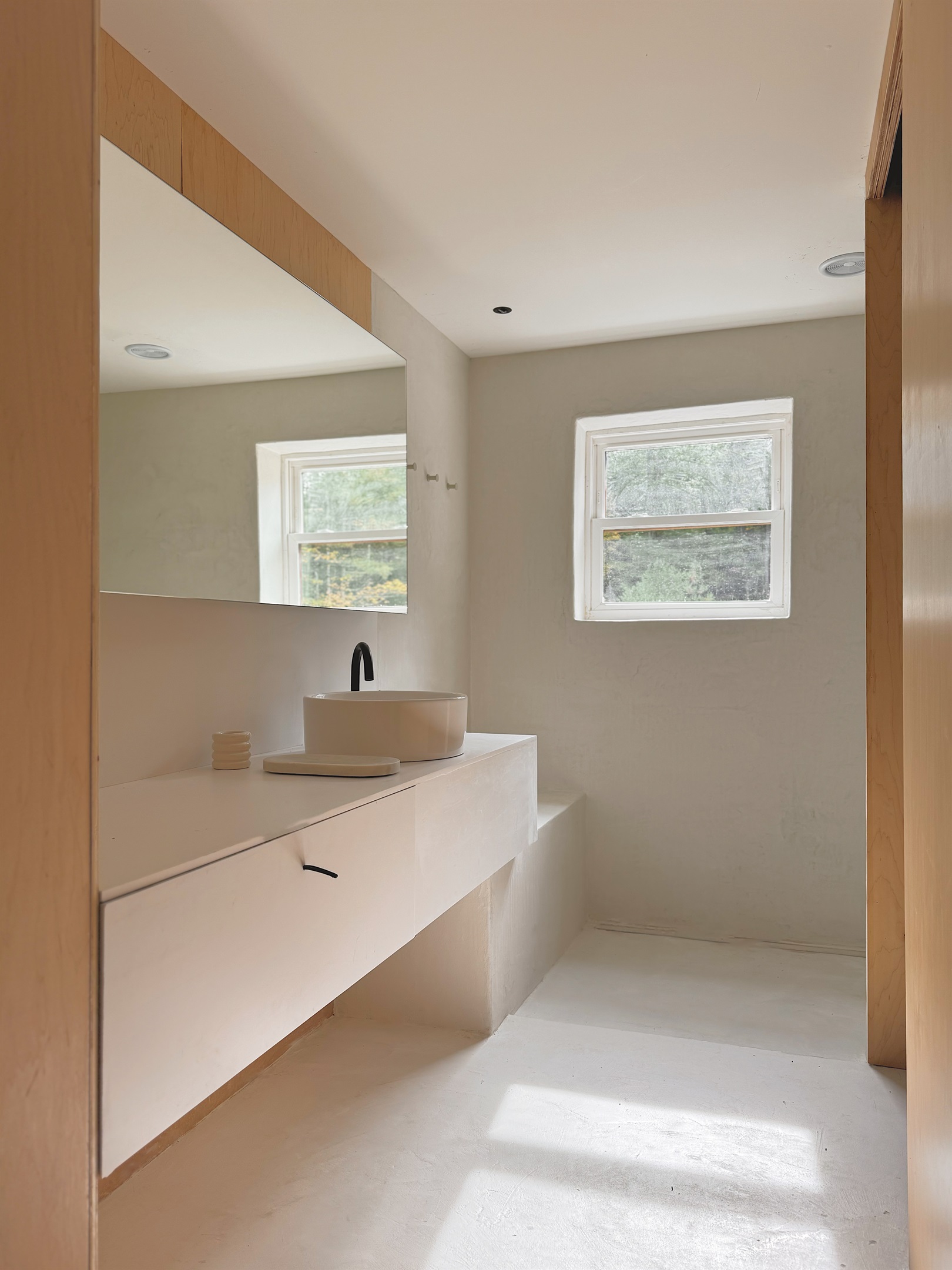 The full bathroom is located upstairs, and features an enclosed toilet room.