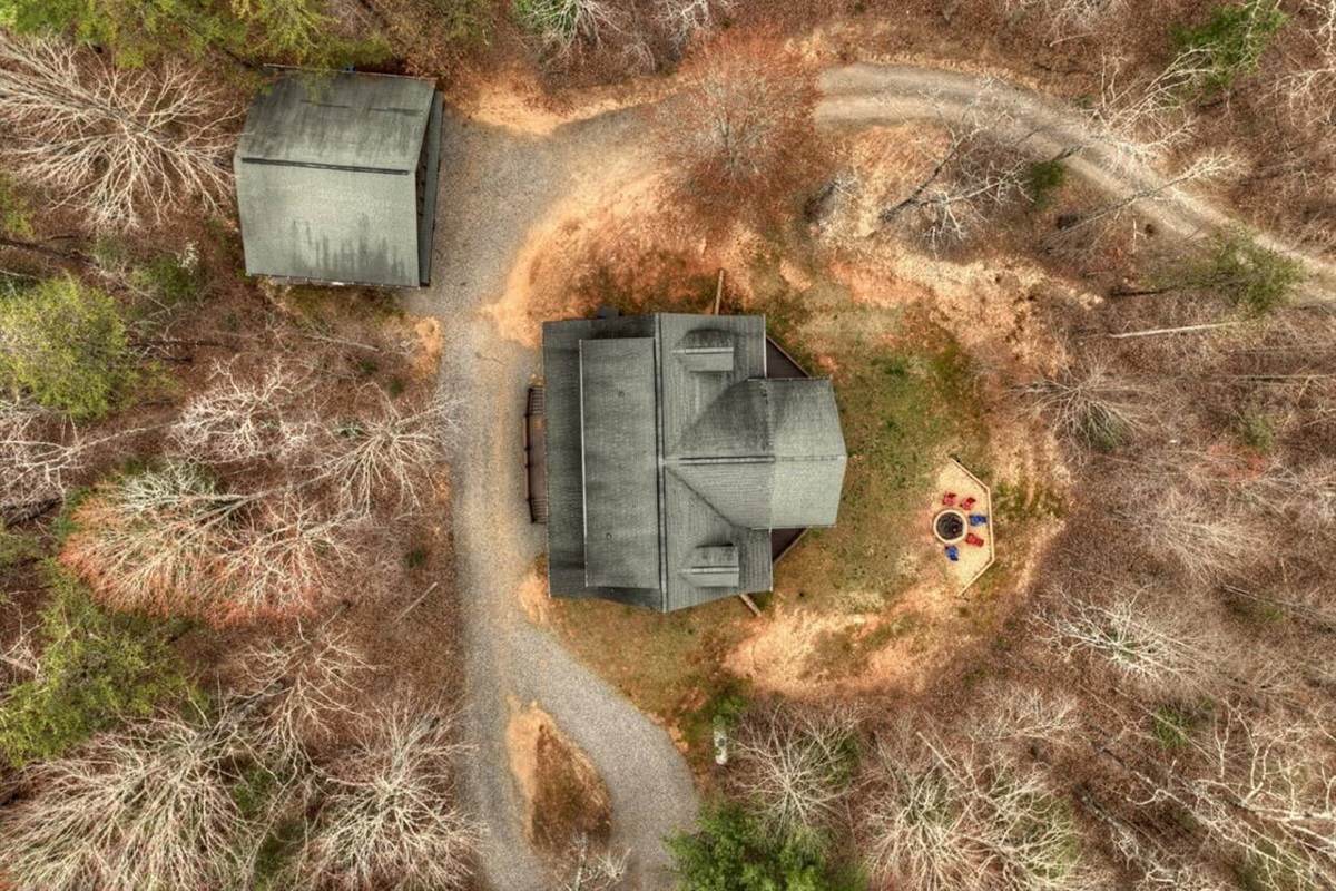 Capture a bird's-eye view of the house from above using a drone