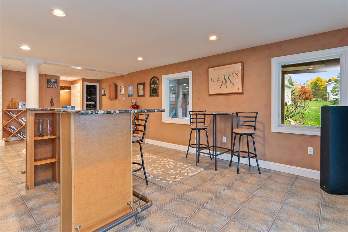 Lower level living room with bar and pool table