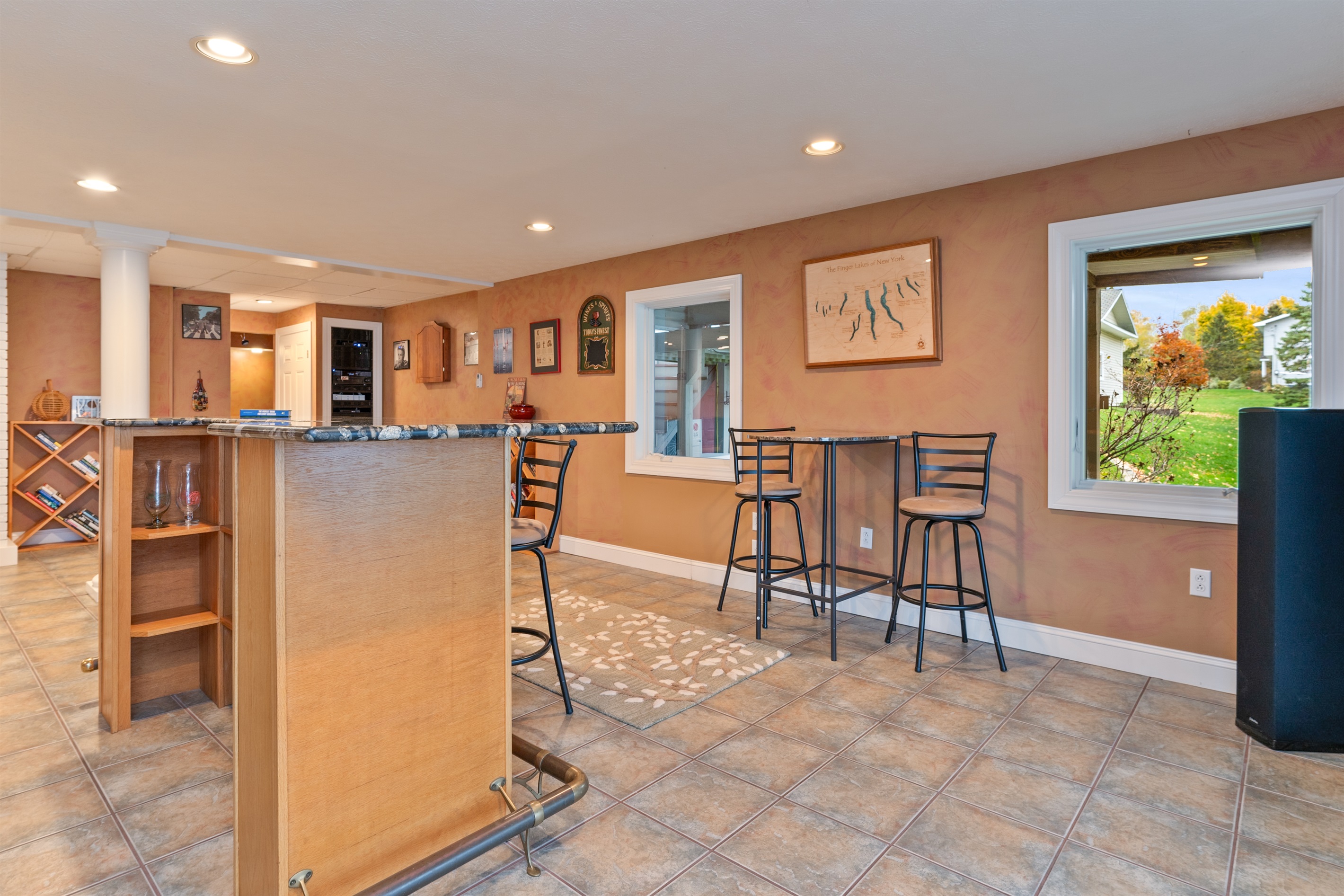 Lower level living room with bar and pool table