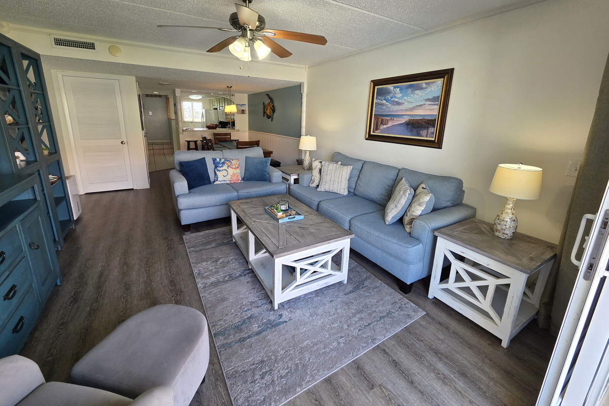 Stylish coastal living room with plush sofas and plenty of space to relax.