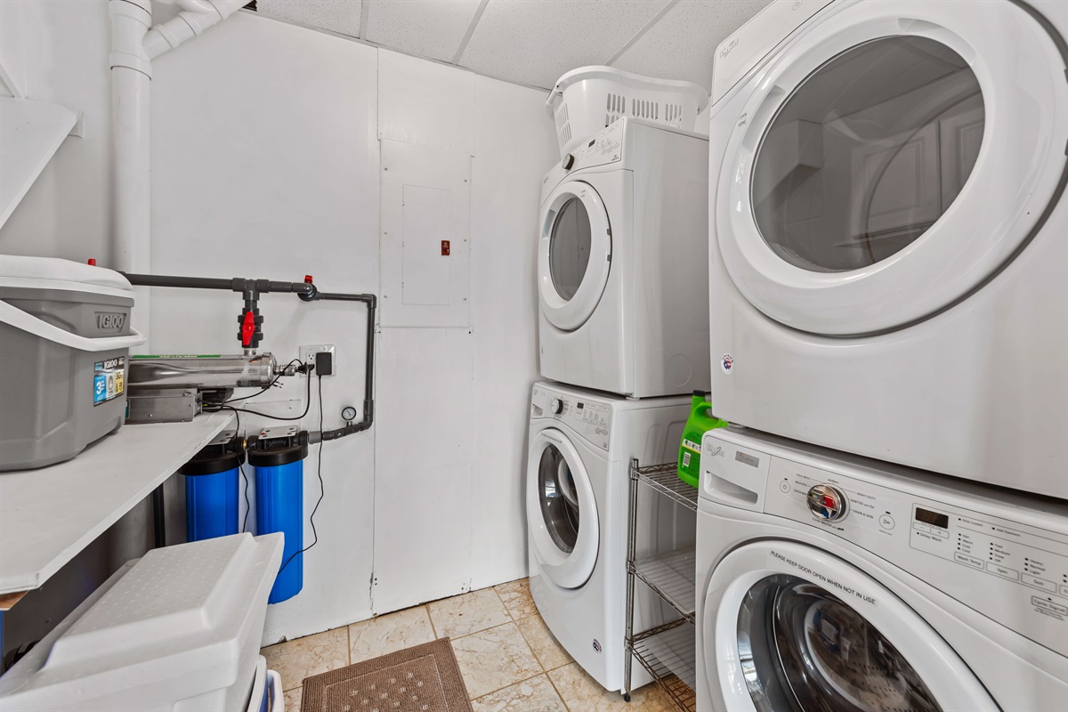 The laundry room, located off the bonus living room has dual washers and dryers