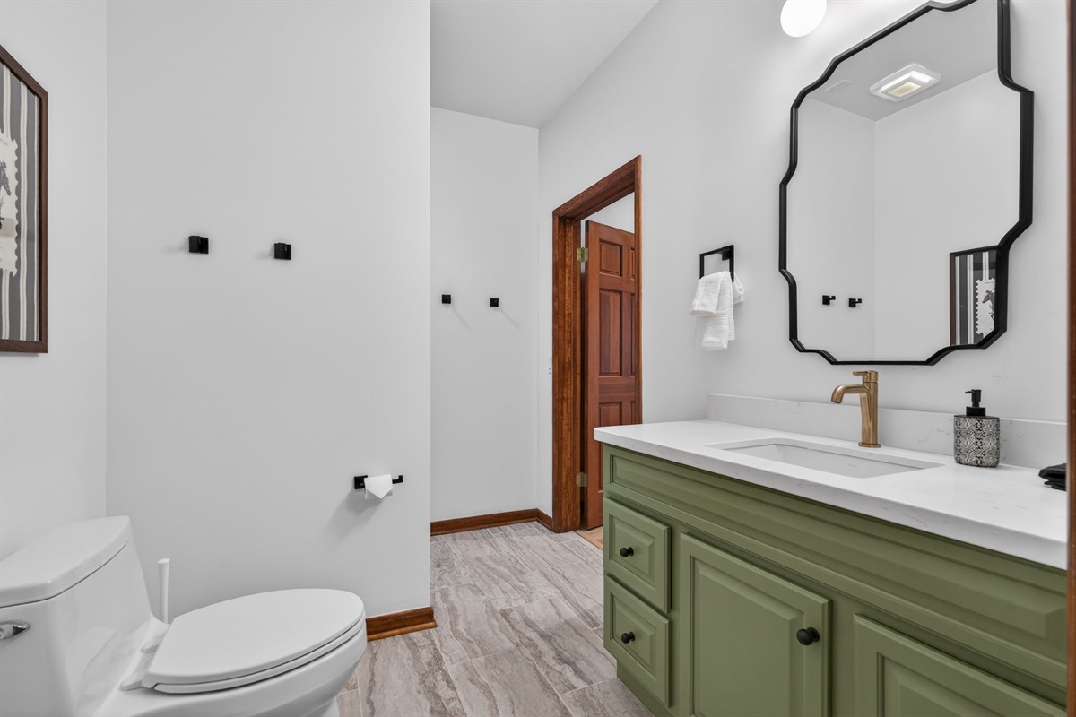 Bathroom 4- Modern full bath with a bold tiled stand-up shower—sleek, stylish, and spa-inspired. (Downstairs)