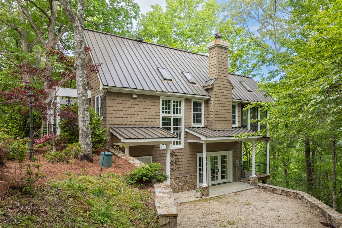 The home offers convenient parking areas with easy access to the main and lower levels of the property.