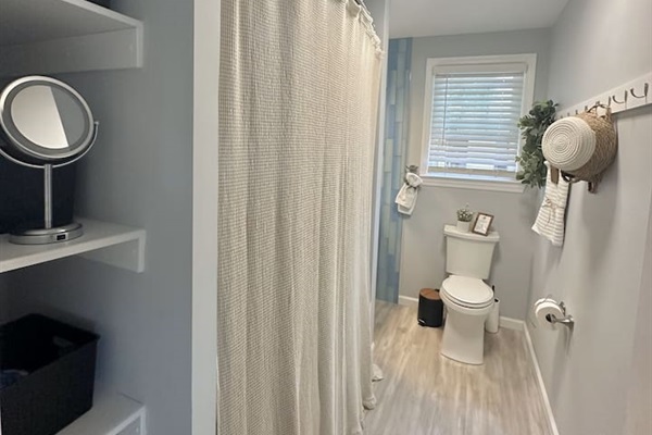 Full Bath with tub shower front of house 