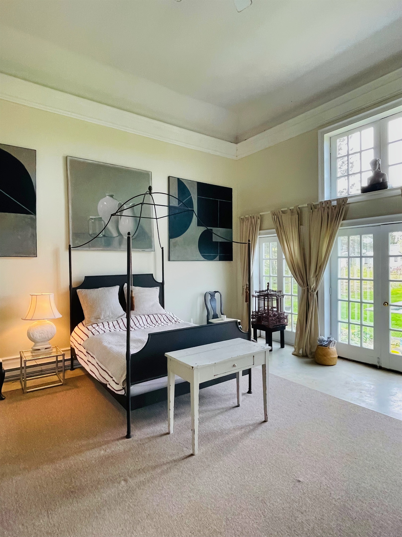 Hawk Field Pool House queen bed in the main space.