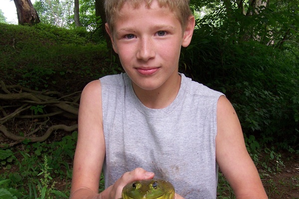 huge frog caught on riverbank in front of our house.