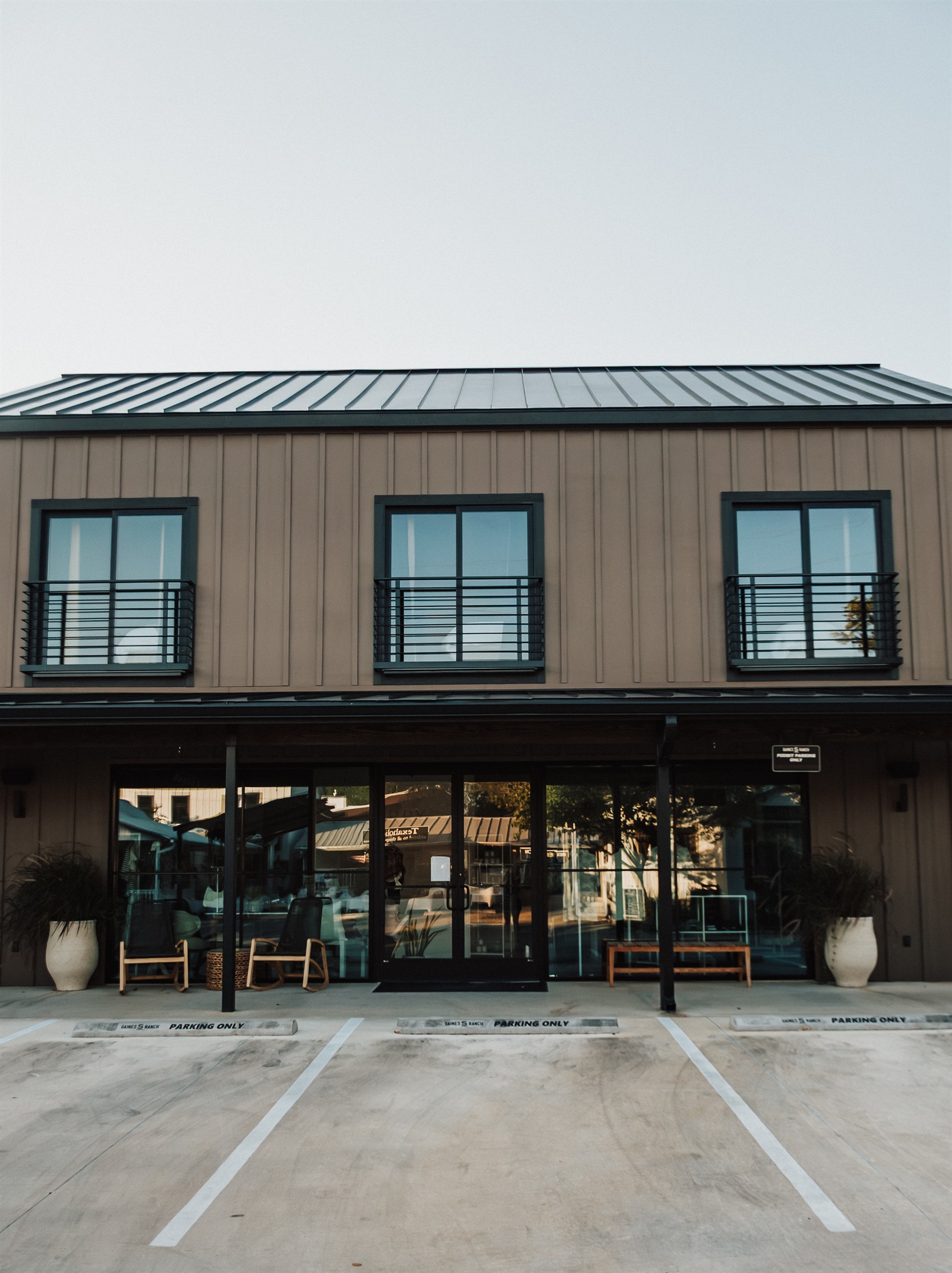 Gaines Ranch on the Square — five private suites and a shared upstairs walkway, all yours when your group reserves the entire property.