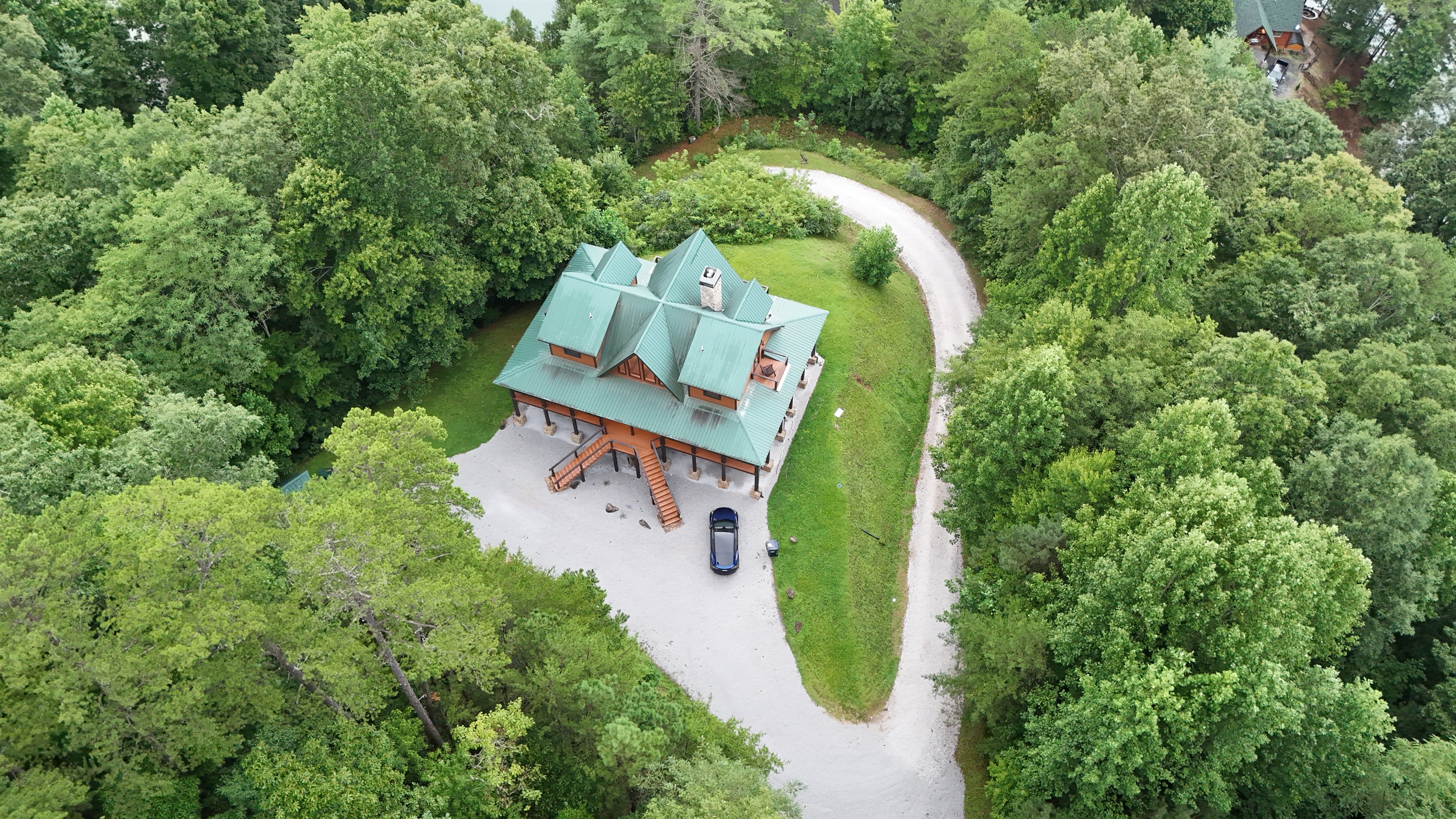 Spacious mountain retreat. This expansive log cabin offers ample space and stunning outdoor living areas.