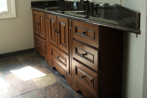 2nd Floor large full bathroom showing two sinks and radiant heated flooring