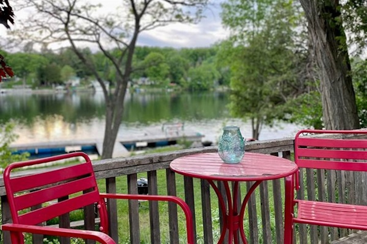 Outdoor dining area with waterfront views