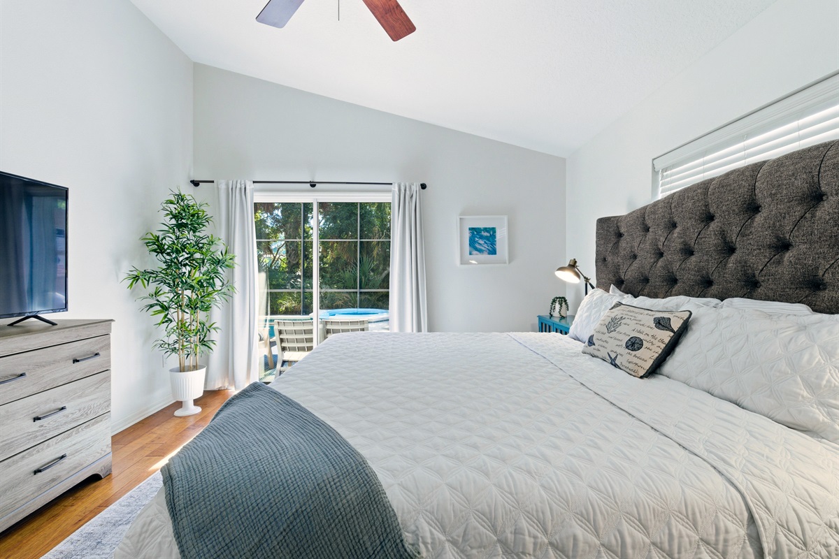 King bed, TV, slider to pool