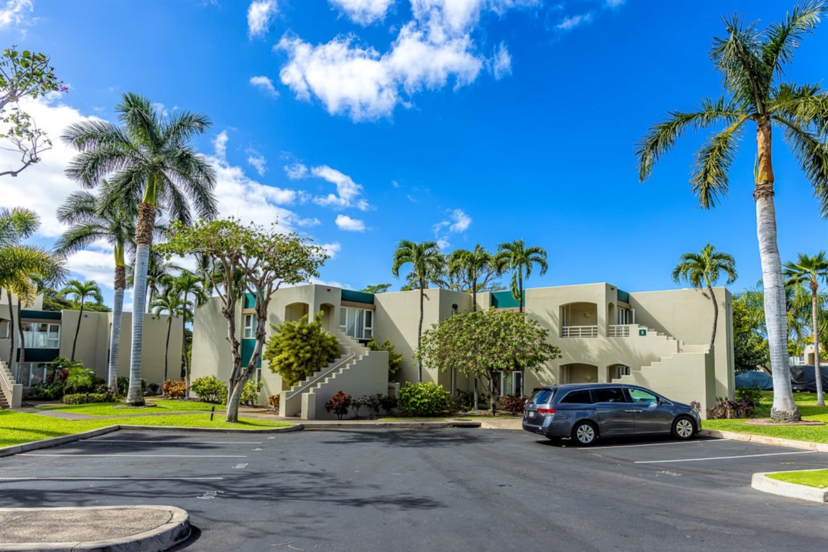 Coming down the driveway, the condo is straight ahead, behind the staircase (it is the ground floor unit). Your designated parking stall is where the van is parked.