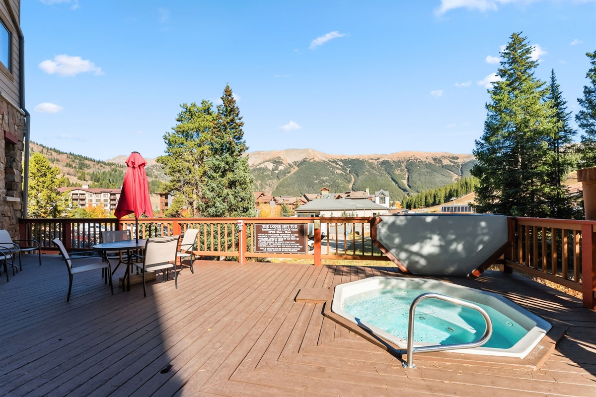 First floor shared hot tub with mountain views