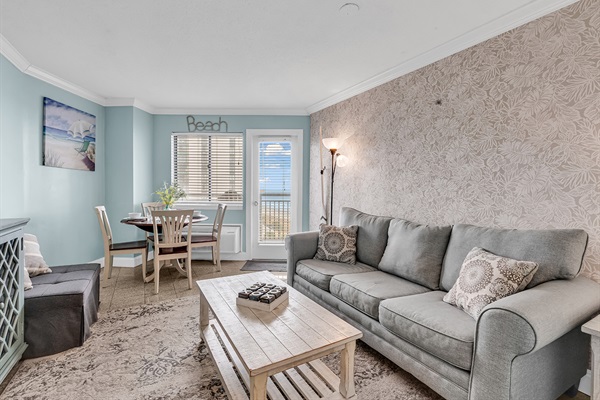 Living and dining area — open layout with room for the whole group to relax and eat together