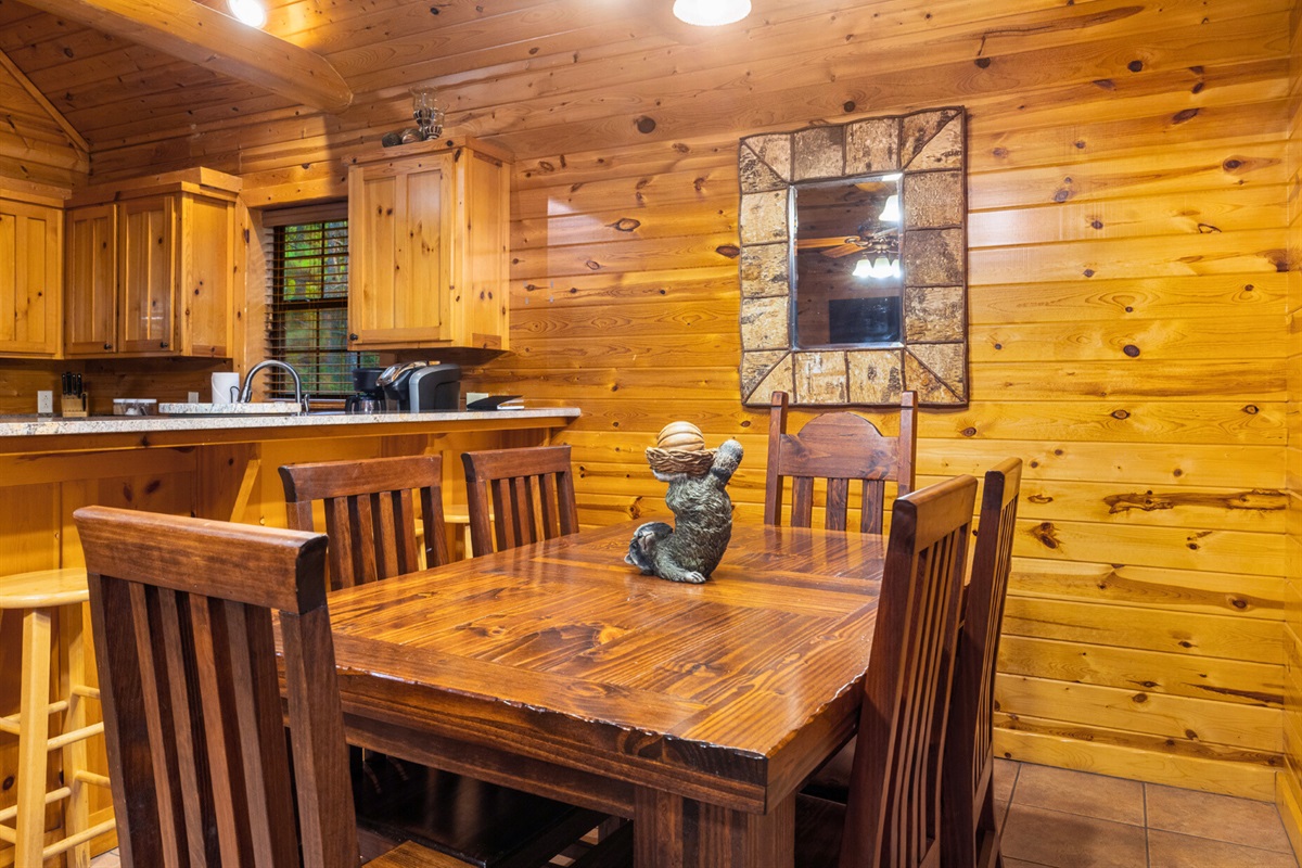 Wooden dining nook with rustic charm.