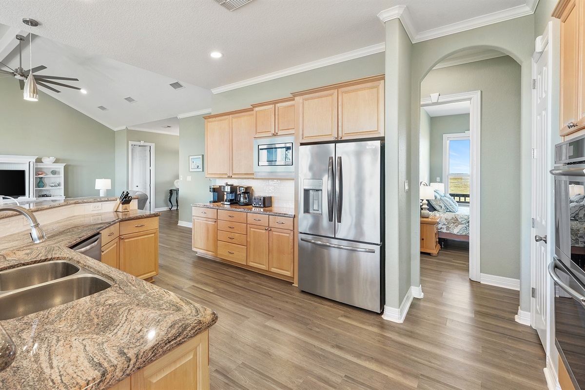 A host of modern appliances and an extra-large refrigerator, for the budding cook.