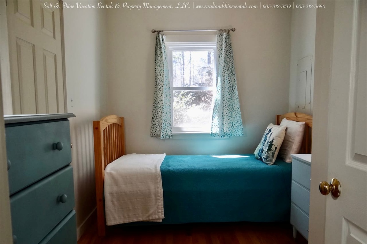 First bedroom with twin bed and full space for all the beachy stuff!