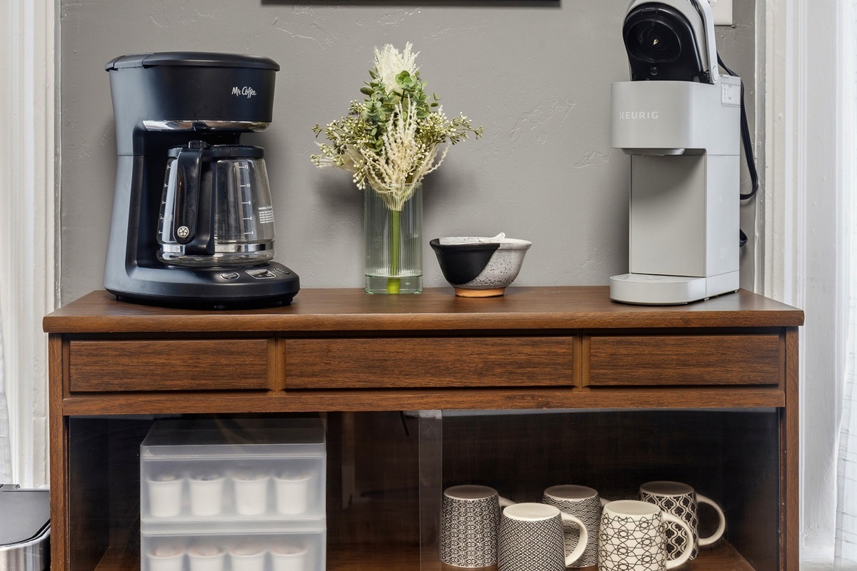 Start your morning right with a drip coffee maker or Keurig, plus a fully stocked tea and mug collection