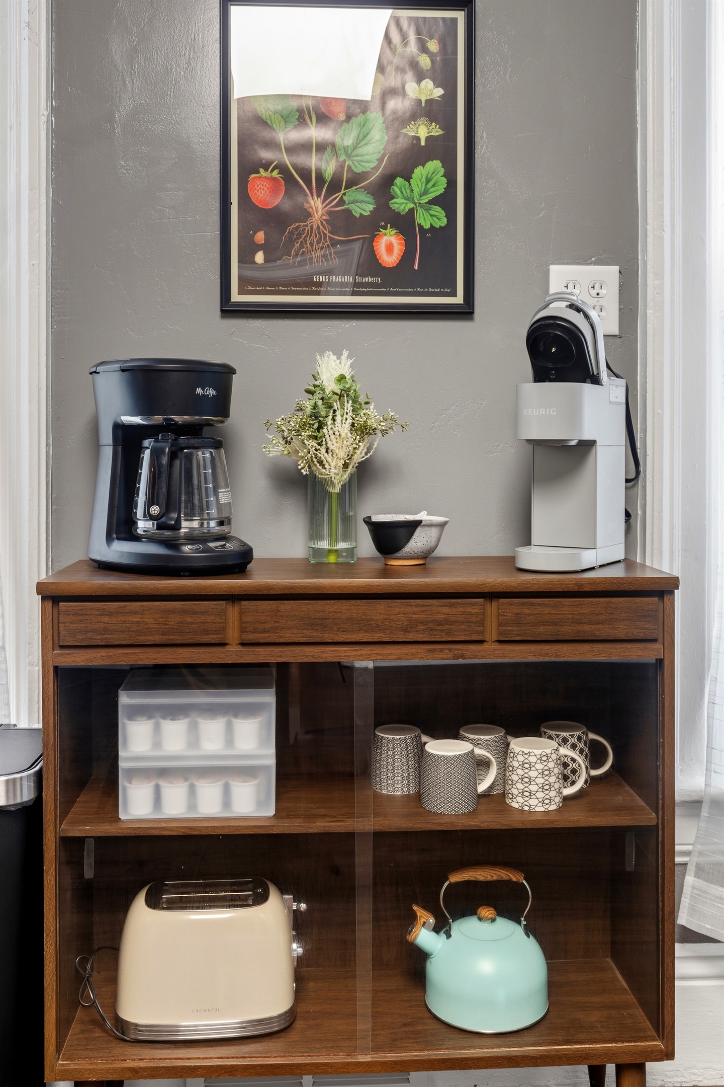 Start your morning right with a drip coffee maker or Keurig, plus a fully stocked tea and mug collection