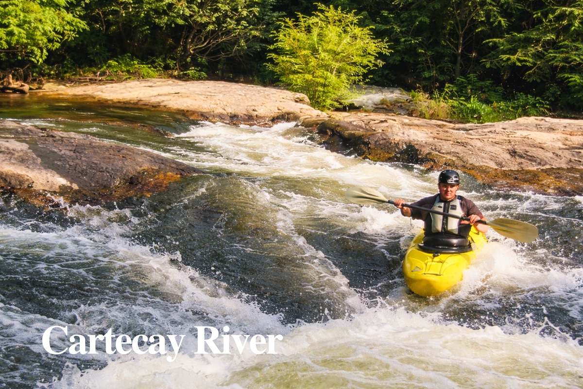 The Cartecay River winds through North Georgia, offering kayaking, tubing, and fishing in a setting as peaceful as it is beautiful.