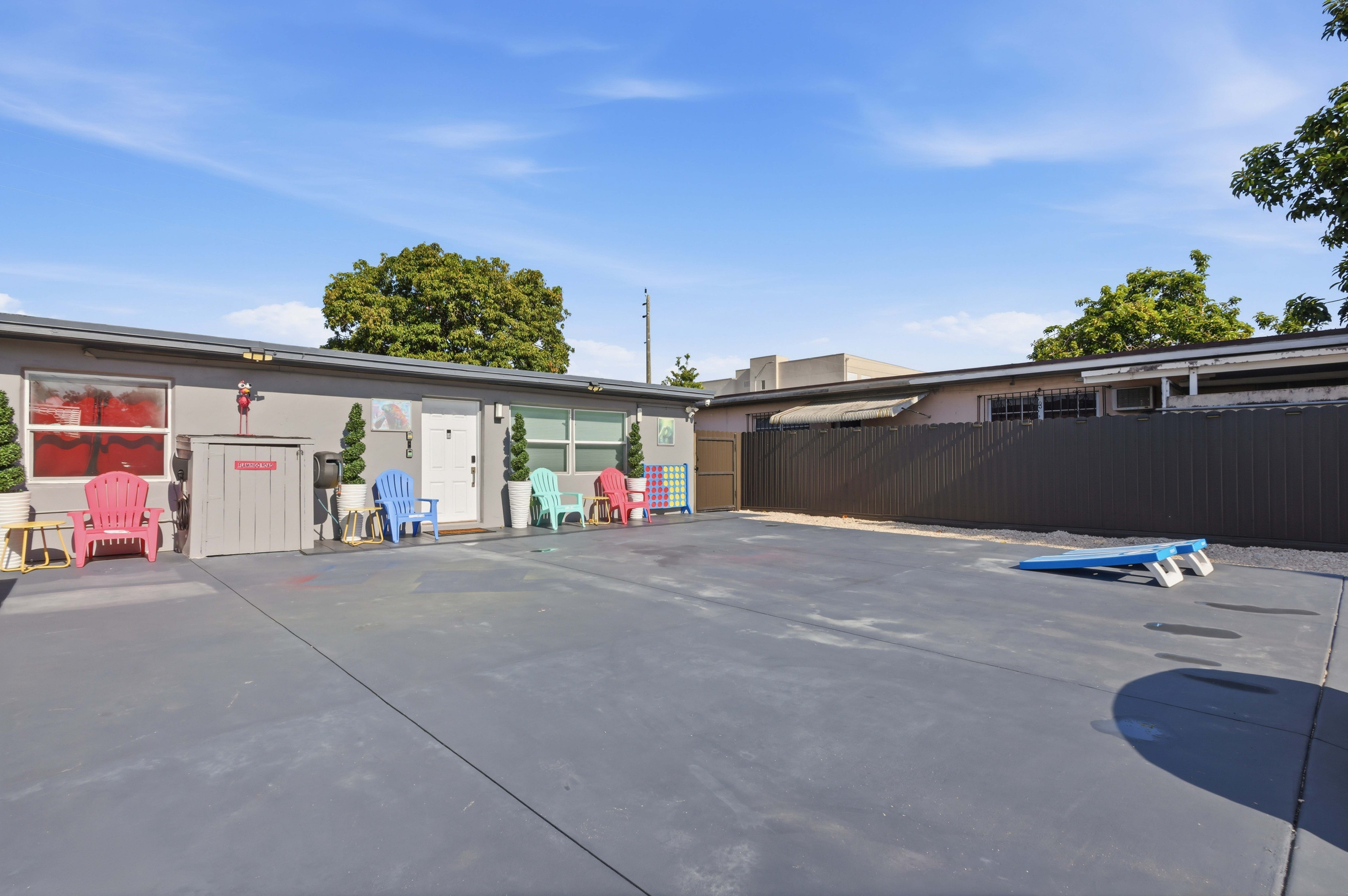Backyard Concrete Area, Outdoor Chairs, Coffee Tables - Designated Outdoor Fun Activities