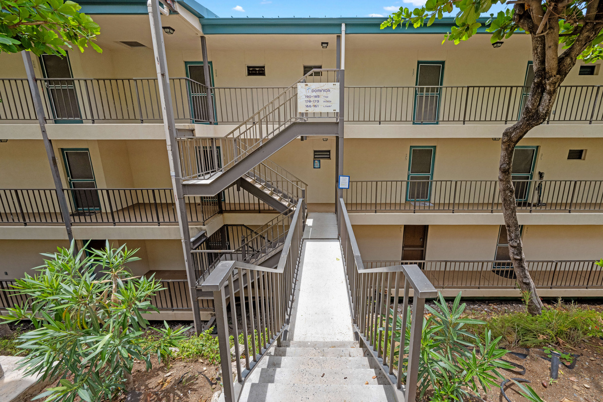 Two sets of stairs from the parking area will bring you down to the condo.