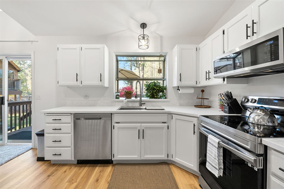 All new stainless steel appliances in kitchen