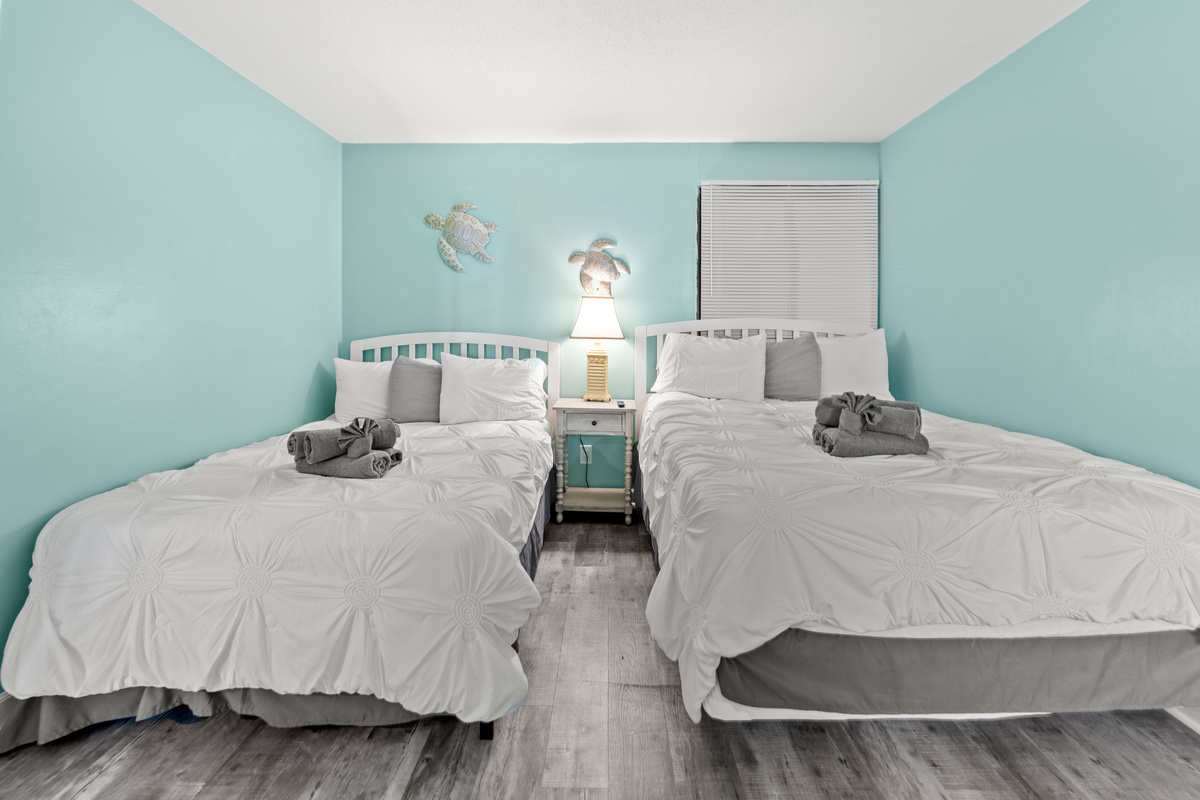 2nd Bedroom with a queen and double bed