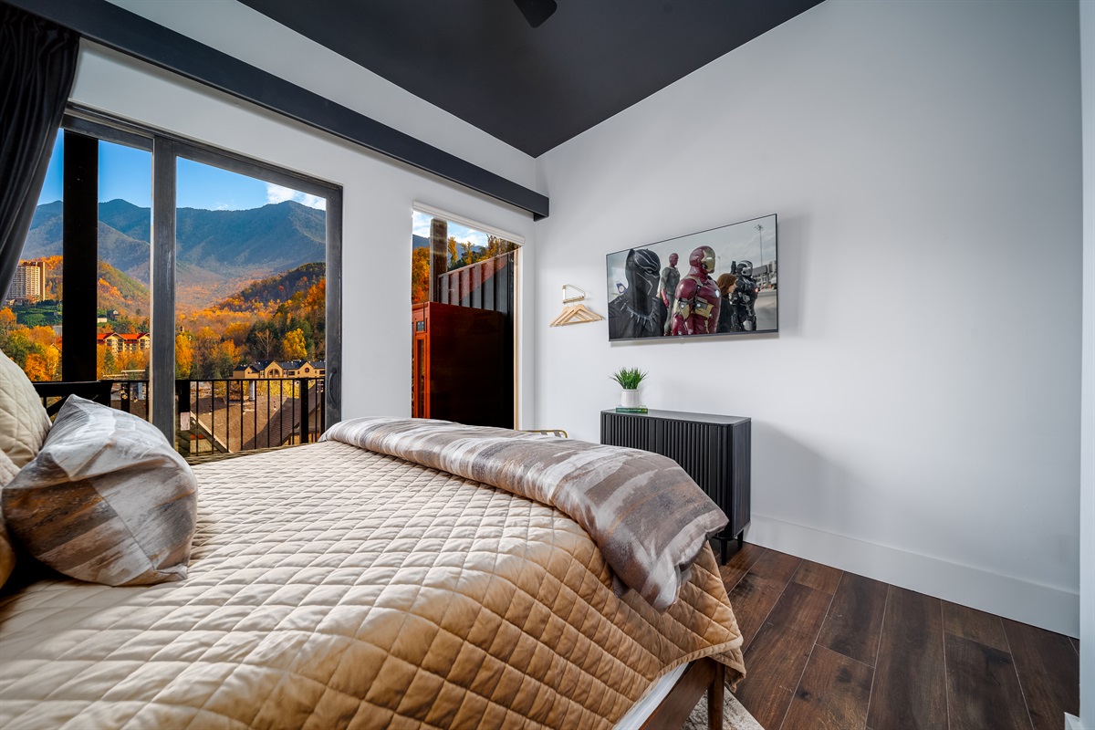 A luxurious Queen bedroom, with beautiful mountain view, designed for ultimate relaxation and comfort.