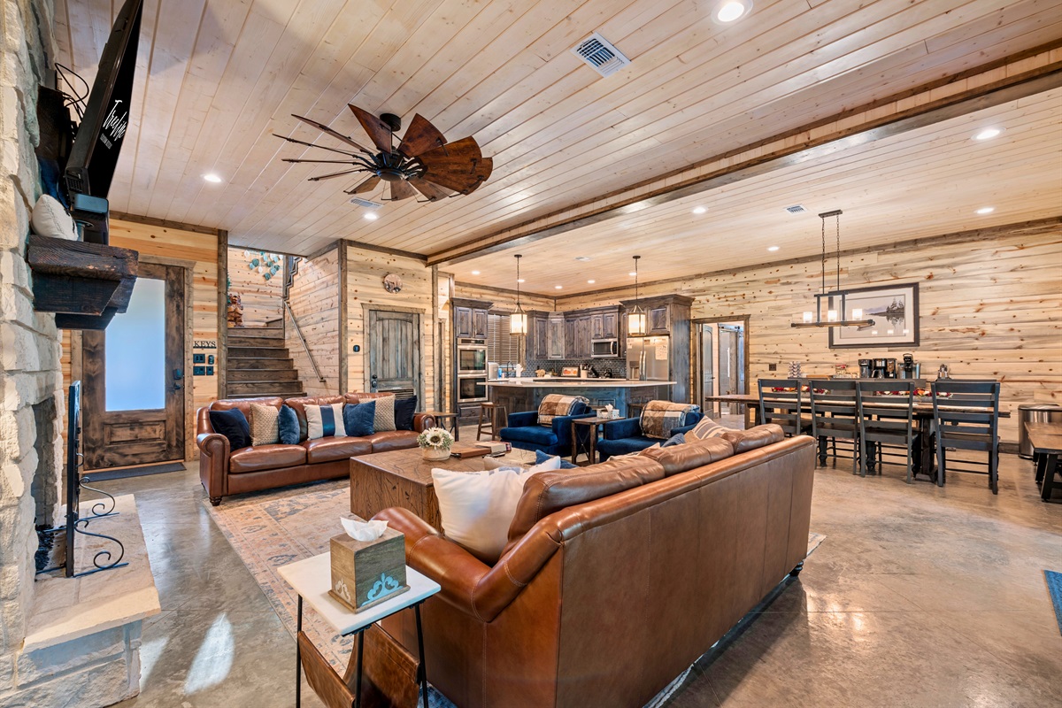 A spacious open-plan living and dining area creates the ideal setting for family gatherings and memorable vacations.