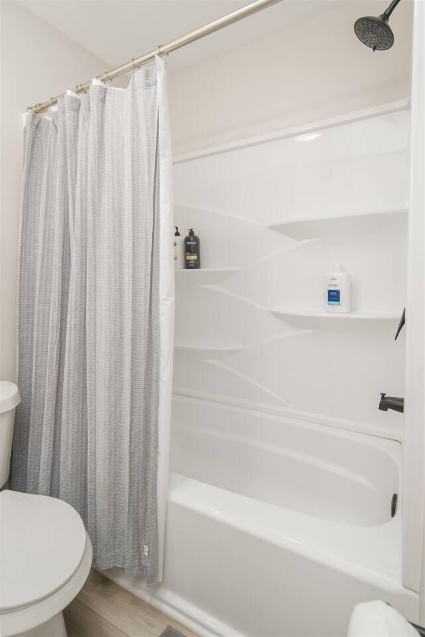 Unit 1: Full Bath (2 of 3) Bed & Bath Linens Provided
