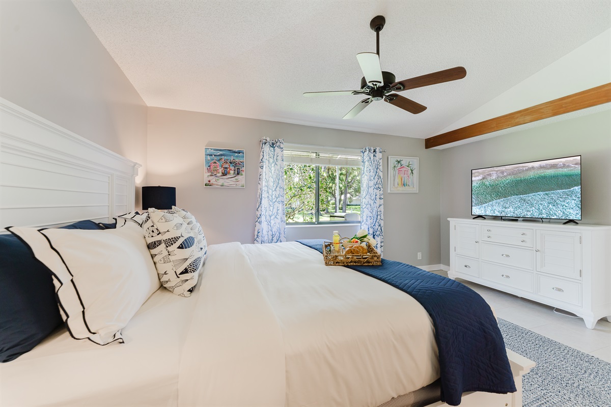 Spacious primary king suite featuring a walk-in closet and a beautifully updated ensuite bathroom—designed for comfort, relaxation, and a true vacation retreat feel
