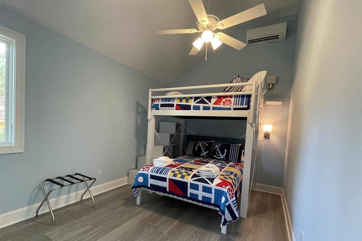 “Anchors Down” bunk room accommodates 4 adults with queen over queen beds.  