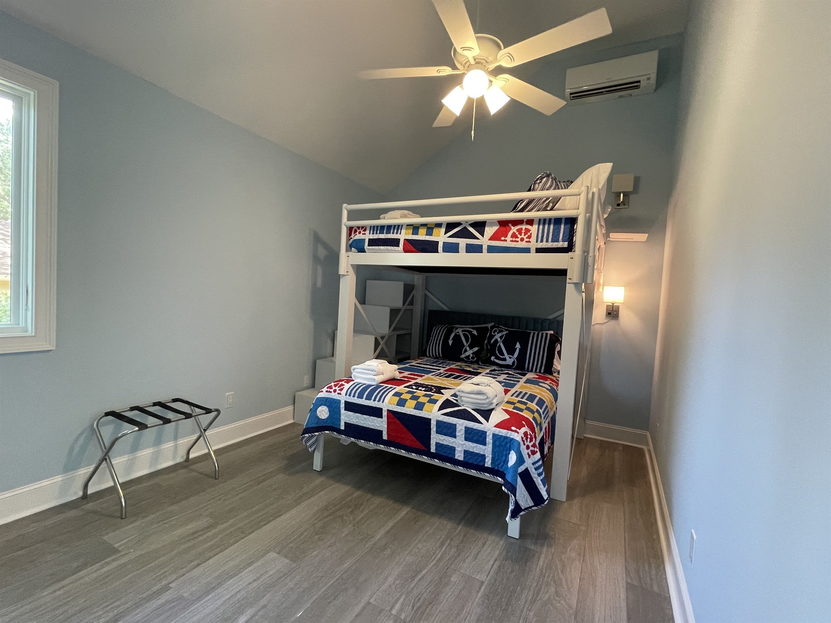 “Anchors Down” bunk room accommodates 4 adults with queen over queen beds.  