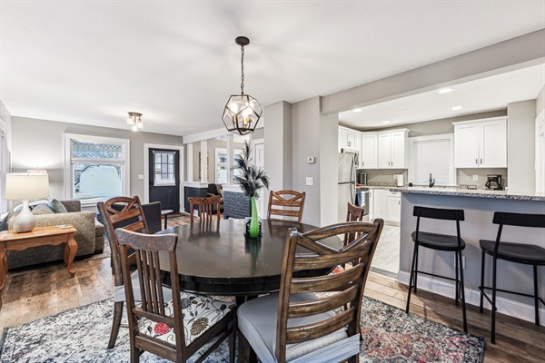 Dining room looking into our open kitchen, with barstools and additional countertop eating and work space.