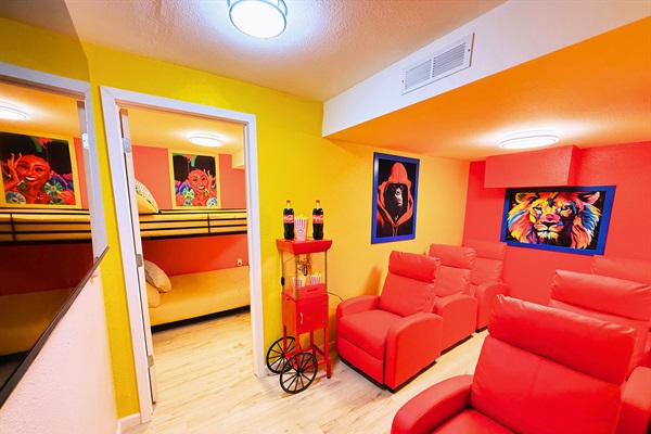 Vibrant vibes & cozy comfort! The perfect spot to relax and enjoy a movie night.