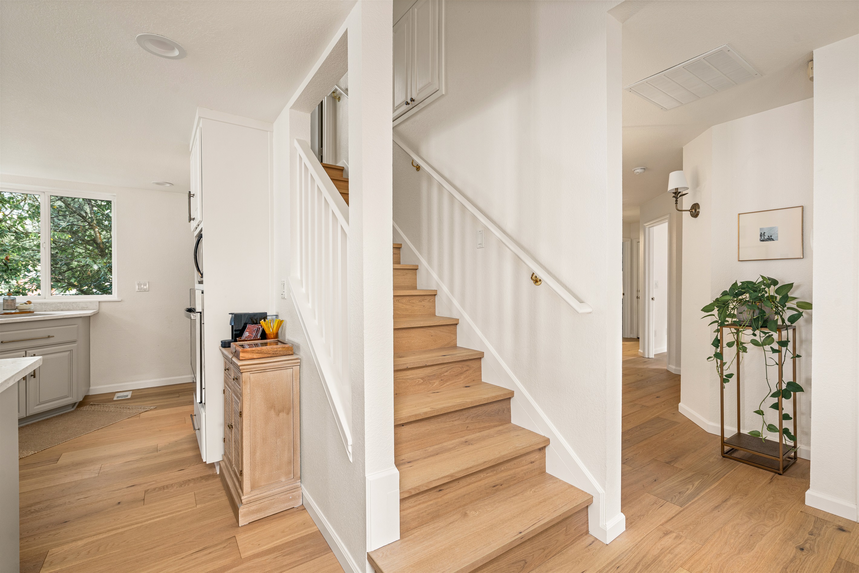 Entry and stairwell to second floor bedroom. 