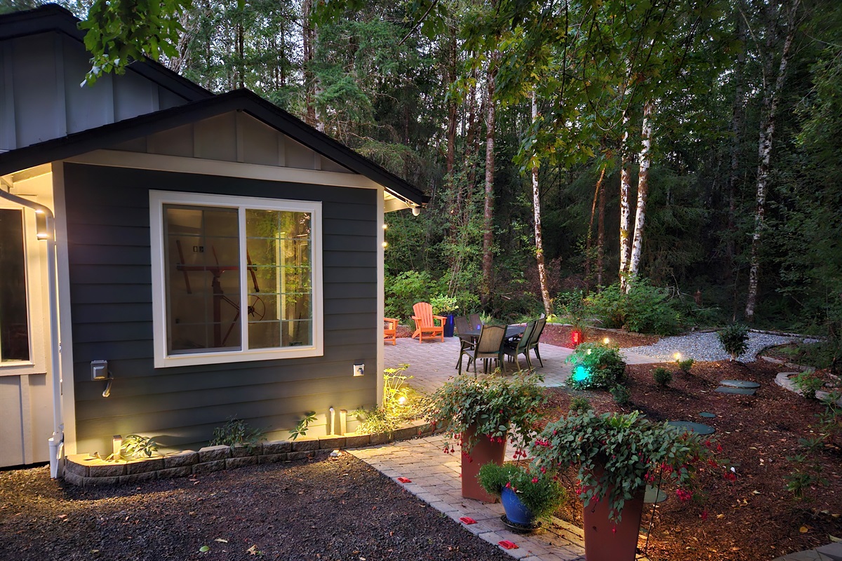 Twilight brings garden magic as the colorful landscape lights illuminate, the daytime critters bed down, and the owls begin to stir.