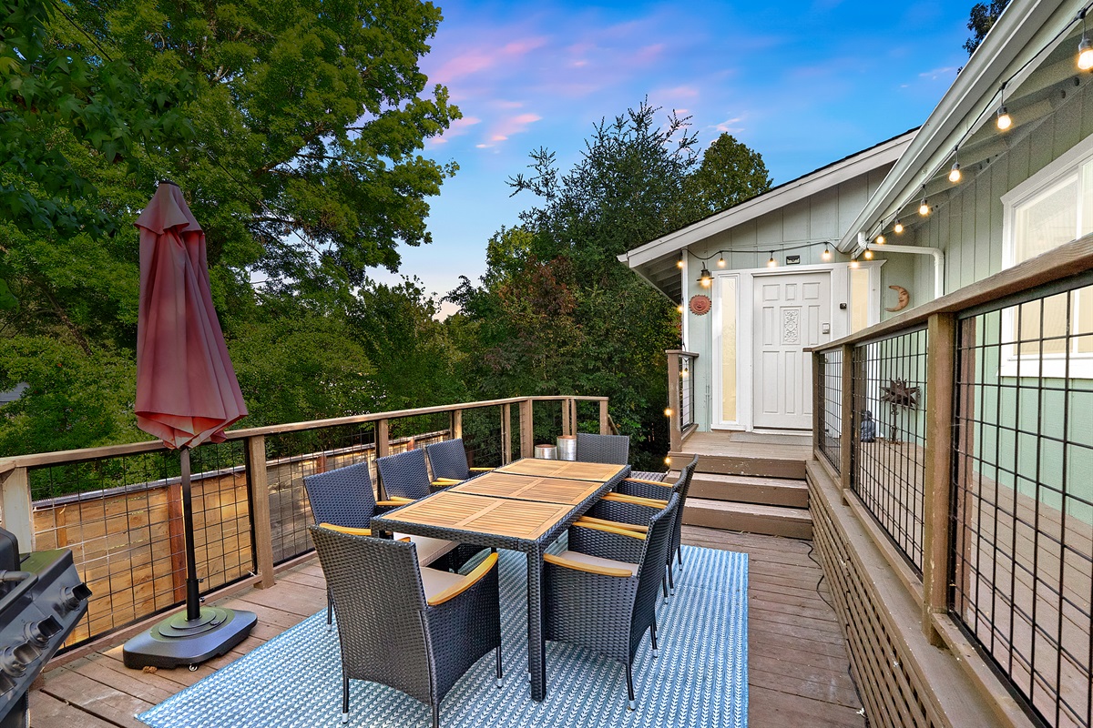 Dine under the stars and string lights on your private deck.